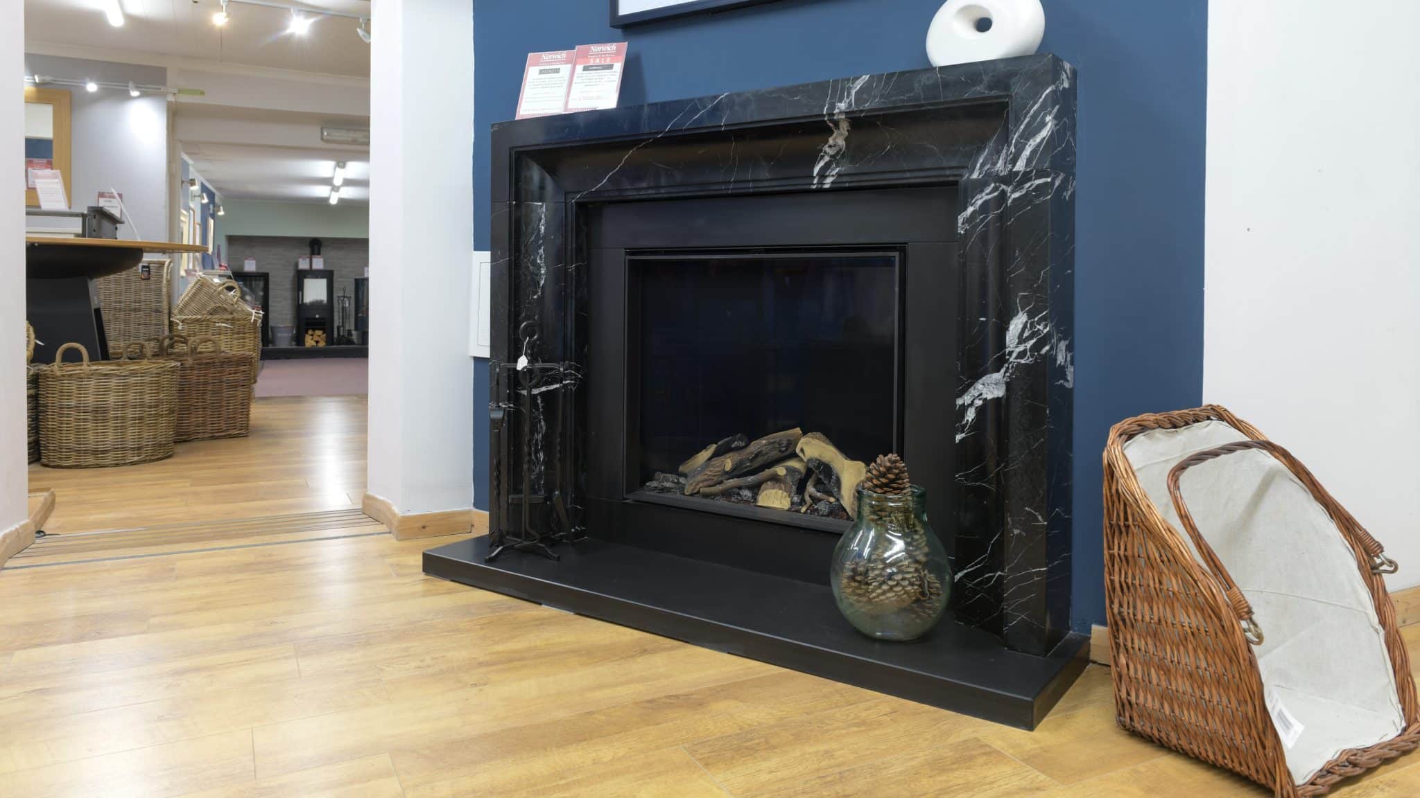 marble fireplace with fire